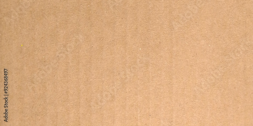 Brown paper texture image. Rough light brown kraft paper banner background with pulp texture