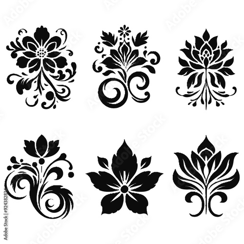Set of elegant black floral ornaments. Decorative flower silhouettes for tattoos, stencils, and graphic design.