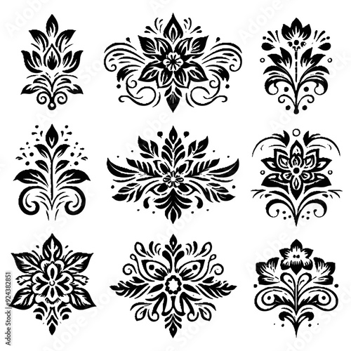 Elegant black and white damask floral designs, perfect for vintage and classic-themed decorative projects.