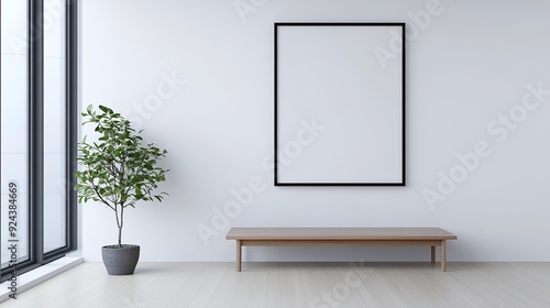 semi close-up of a minimalist interior with a large empty picture frame on the wall, a low wooden bench and a small potted plant, bright natural light from floor-to-ceiling windows, clean and serene photo