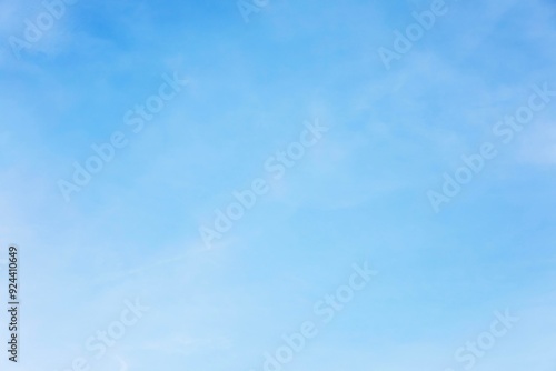 Fantastic soft white clouds against blue sky and copy space horizontal shape photo