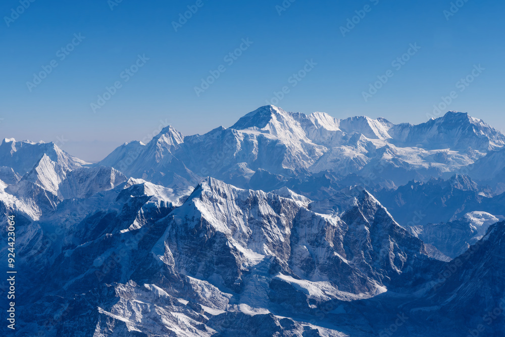 Stunning view from a tourist plane over Mount Everest and the Great Himalayas of southern Asia, Nepal Stunning view from a tourist plane over Mount Everest and the Great Himalayas of southern Asia, Nepal