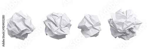 A collection of four crumpled paper balls presented in different angles on a transparent background. 