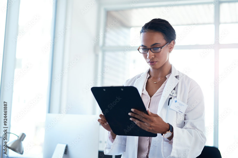 Woman, doctor and reading with clipboard for medical results, information or research at hospital. Female person or healthcare employee checking paperwork, documents or health forms for procedure Woman, doctor and reading with clipboard for medical results, information or research at hospital. Female person or healthcare employee checking paperwork, documents or health forms for procedure