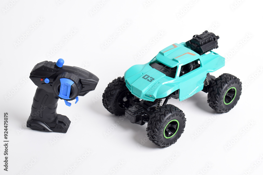 Obraz premium RC model rally, off road buggy with remote control. Isolated on white background