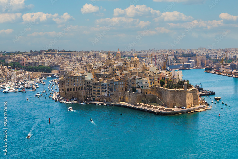 Malta, a beautiful island with a lot of monuments. The photo shows a view of Valletta from the Upper Barrakka Gardens. Malta, a beautiful island with a lot of monuments. The photo shows a view of Valletta from the Upper Barrakka Gardens.