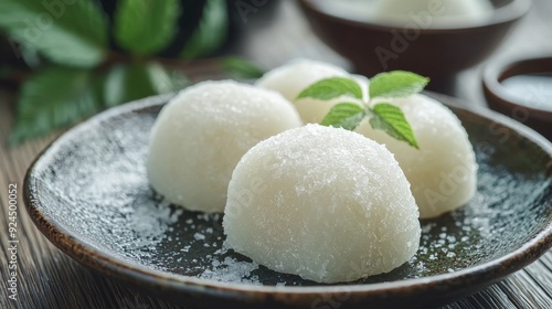 Traditional Japanese Mochi Rice Cakes on a Ceramic Plate