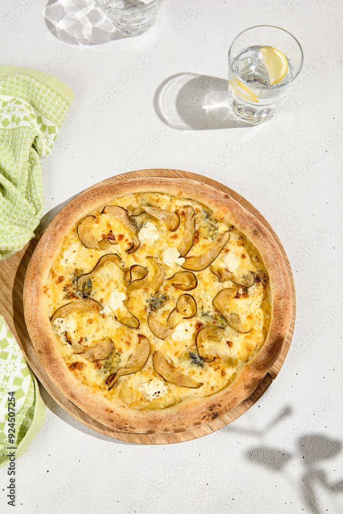 Top View of Gourmet Pizza with Pears and Gorgonzola on Rustic Wood Panel Top View of Gourmet Pizza with Pears and Gorgonzola on Rustic Wood Panel