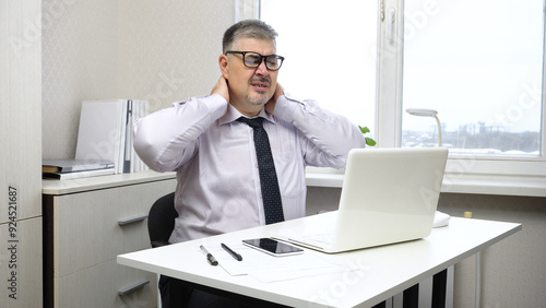 Office Worker Rubbing Stiff Neck