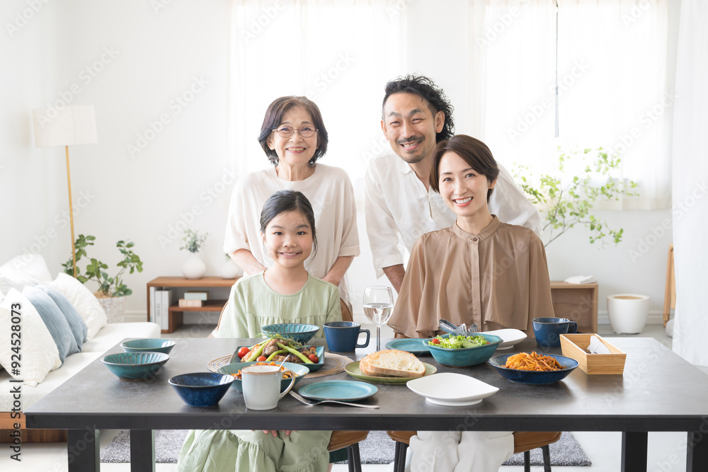 Family dining table, including three generations of Japanese (two-family house) Smiling for the camera Family dining table, including three generations of Japanese (two-family house) Smiling for the camera