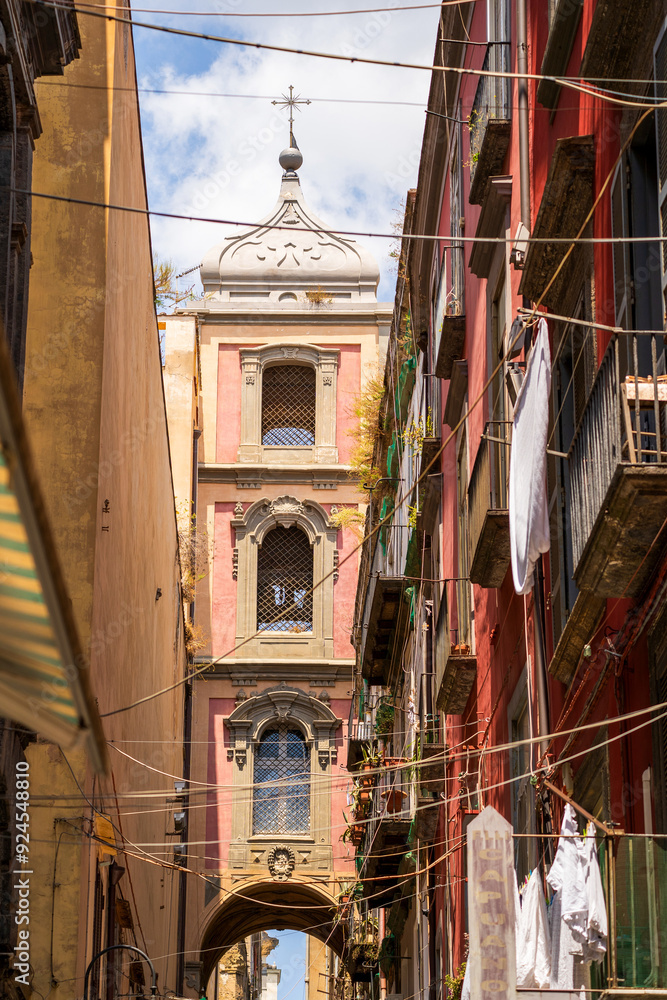 Typical streets of Naples, Italy against blue sky