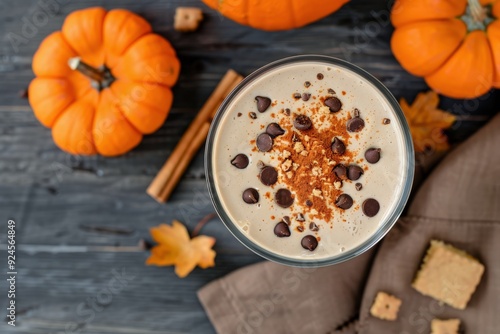 Creamy Pumpkin Smoothie With Chocolate Chips and Cinnamon Sticks
