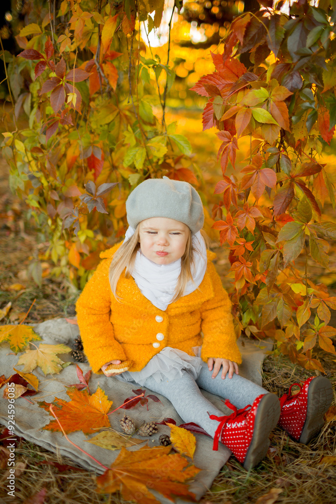 child in autumn park