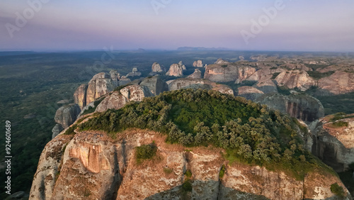 Stunning view of the Pedras Negras Mountains at dusk in Angola showcasing unique rock formations and lush greenery