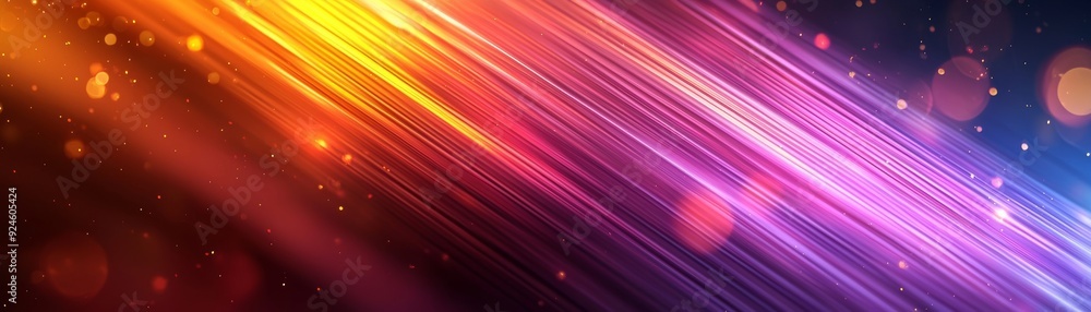 Fototapeta premium Vibrant streaks of light in hues of orange, pink, and blue create a dynamic background full of energy and motion.
