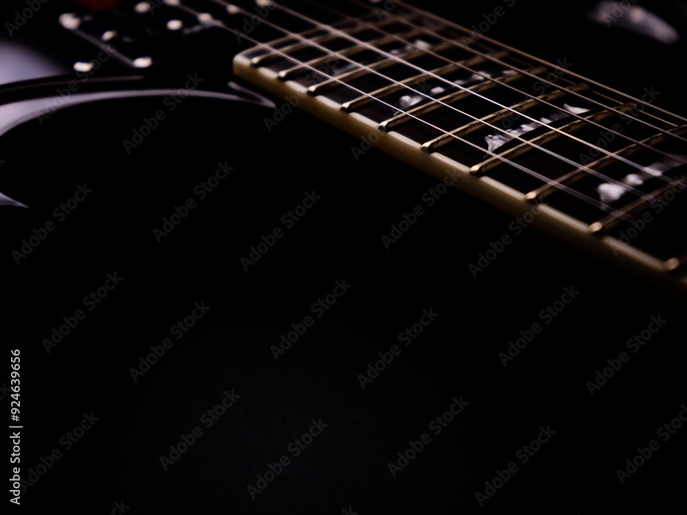 Fototapeta premium Fretboard of modern electric guitar. Close up.