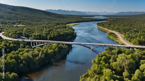 River and lake crossing animation. River flowing into a lake with a bridge spanning the crossing. Harmonious design. photo