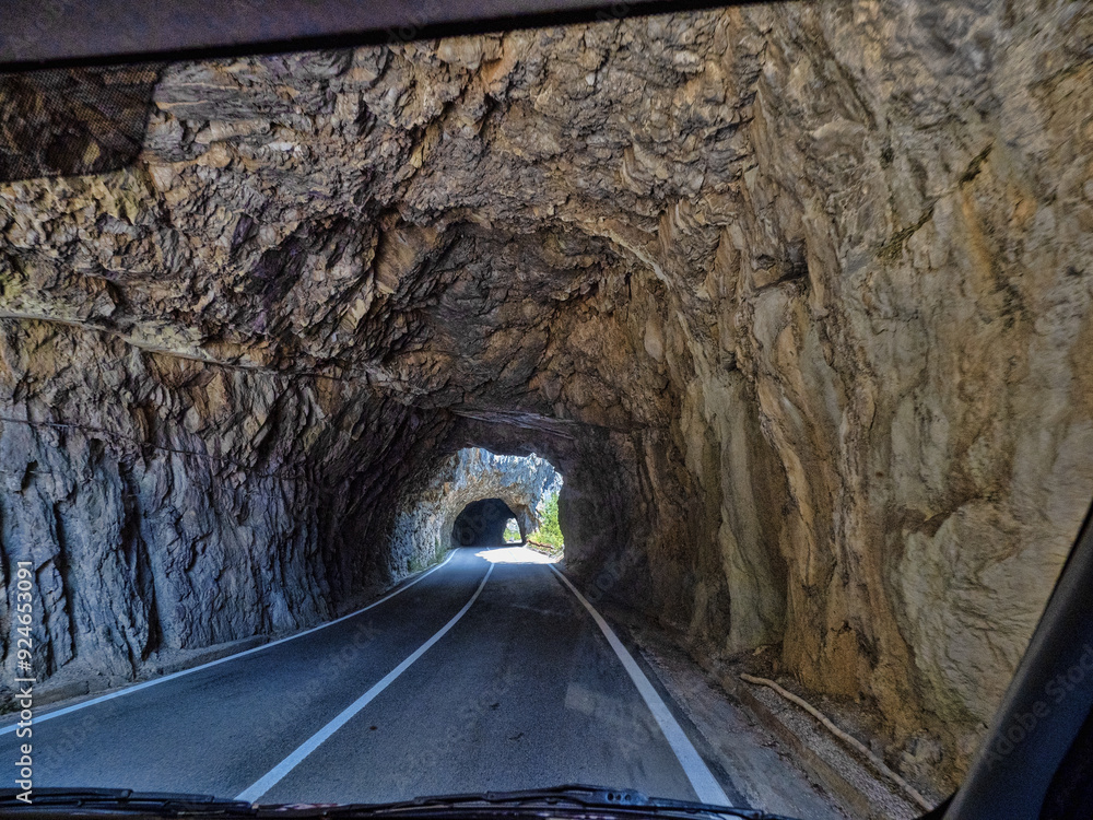 In Montenegro, there are many tunnels carved into the rock.