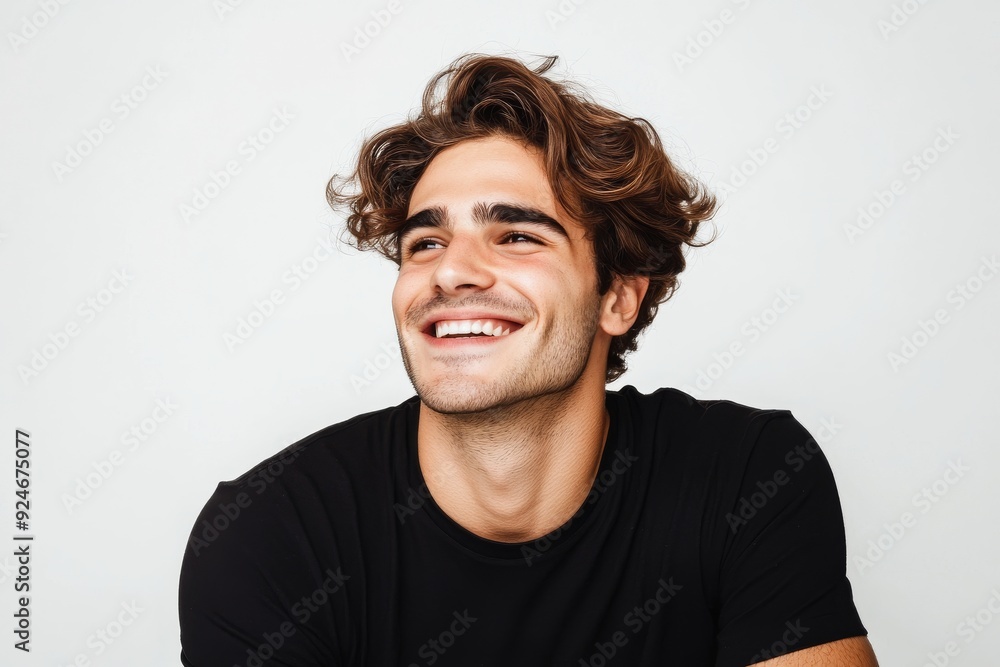 A close-up image of a handsome man who is smiling sideways in a studio, isolated on transparent background A close-up image of a handsome man who is smiling sideways in a studio, isolated on transparent background