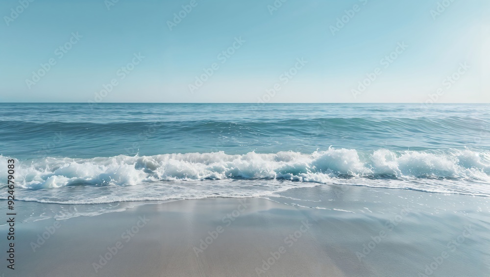 Fototapeta premium Captivating View of a Serene Seascape Where Gentle Waves Embrace the Sandy Shore Under a Soft Blue Sky, Inviting Peacefulness and a Perfect Escape from Everyday Life