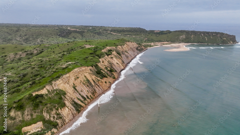 Aerial view of the green coast of Angola showcasing cliffs and sandy beaches Aerial view of the green coast of Angola showcasing cliffs and sandy beaches
