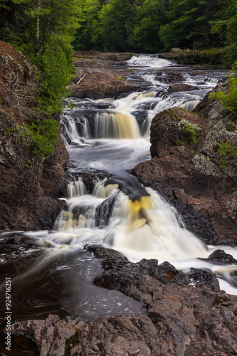 Upper Potato River Falls - A scenic waterfall landscape in the summer.