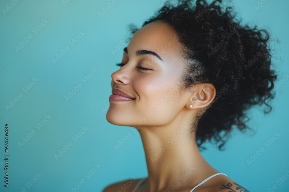 A close up of a woman's face with tattoos and her eyes closed A close up of a woman's face with tattoos and her eyes closed