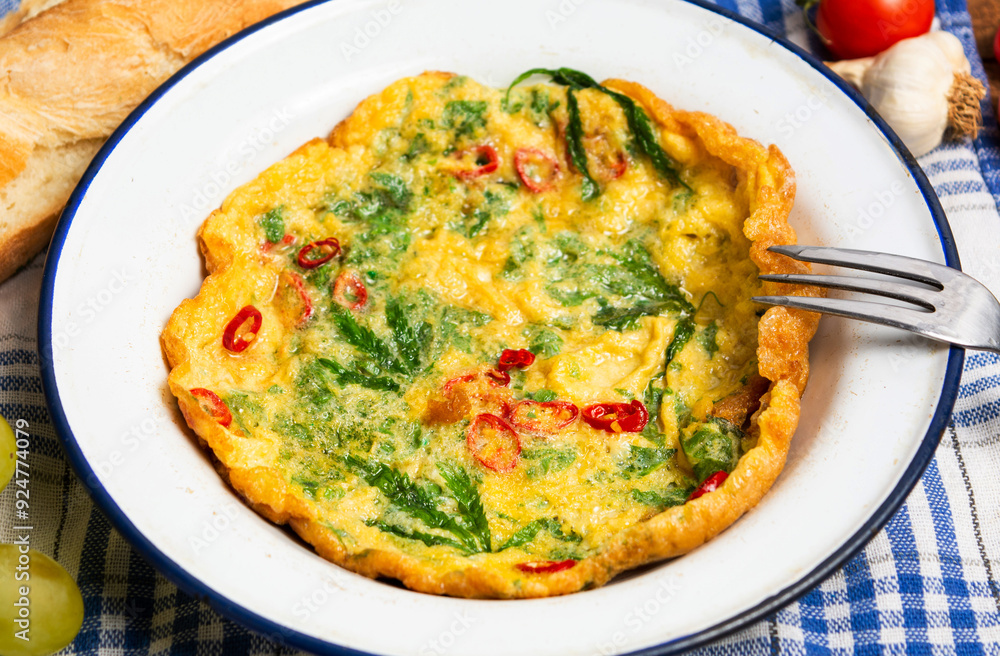 Egg omelet with marijuana leafs on a plate