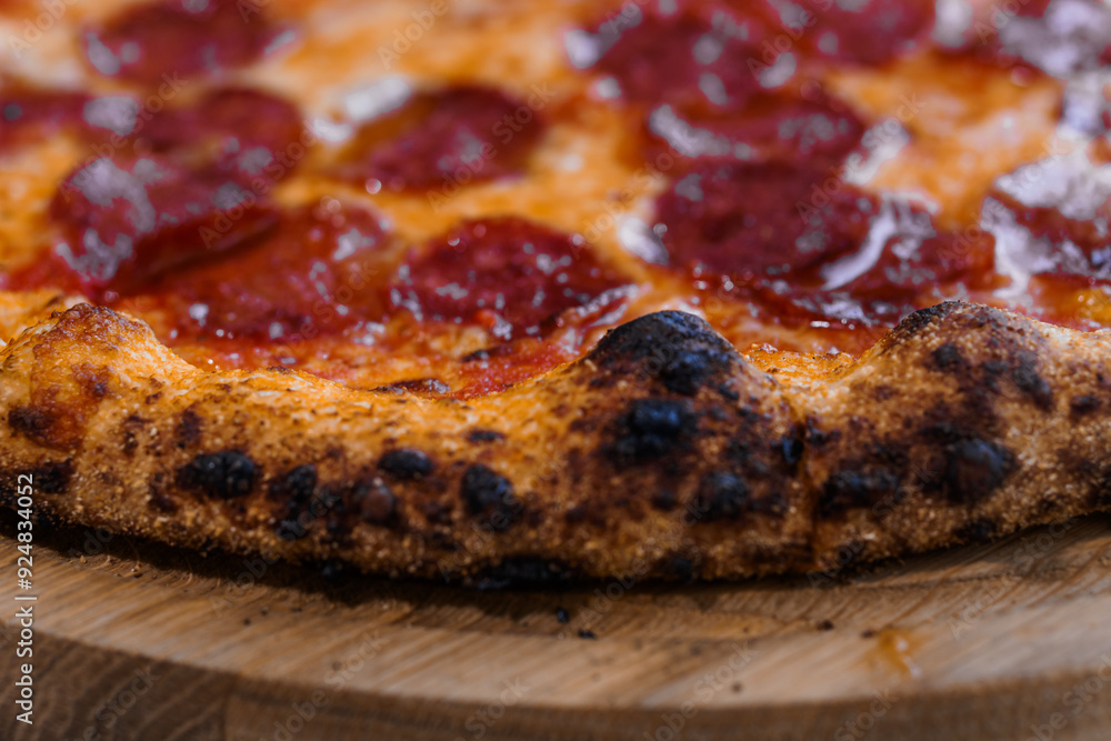 Pizza with salami and prosciutto. Meat pizza with cheese Pizza with salami and prosciutto. Meat pizza with cheese