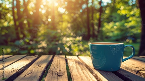 Coffee cup on wooden table outdoors