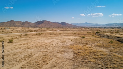 Vast Desert Landscape with Mountain Range Background, Prime Development Property