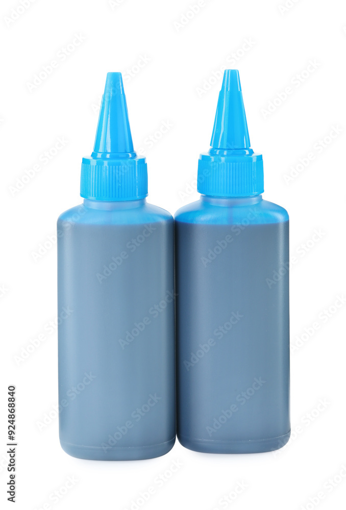 Bottles of light blue printer ink isolated on white Bottles of light blue printer ink isolated on white