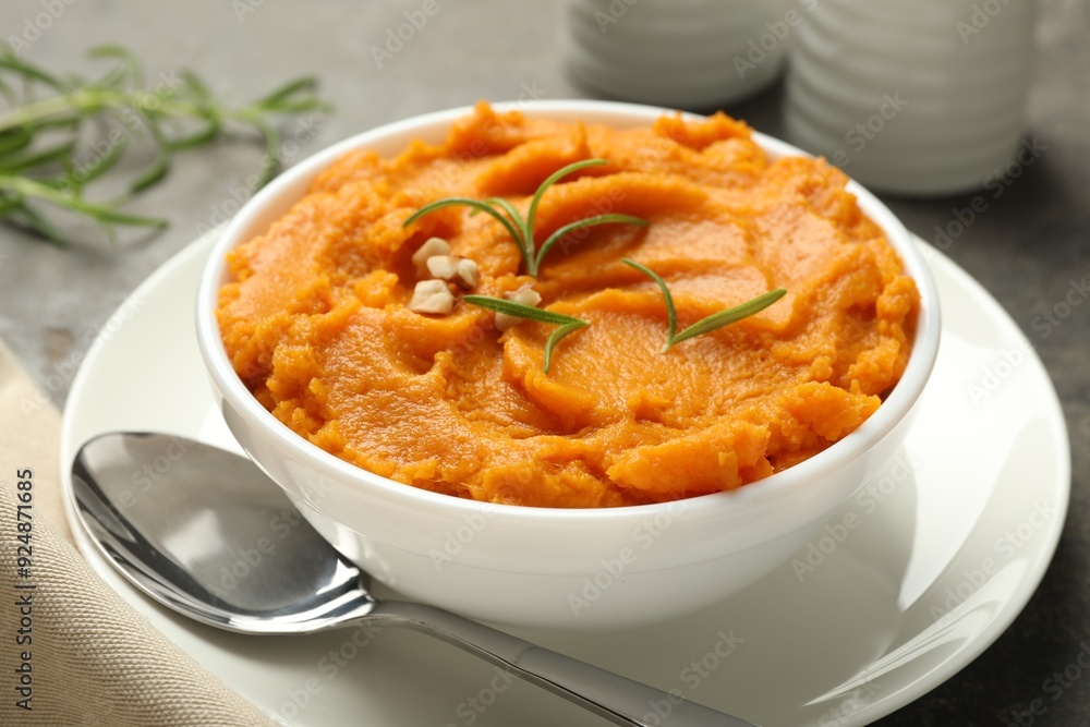 Delicious mashed sweet potatoes served on table, closeup Delicious mashed sweet potatoes served on table, closeup