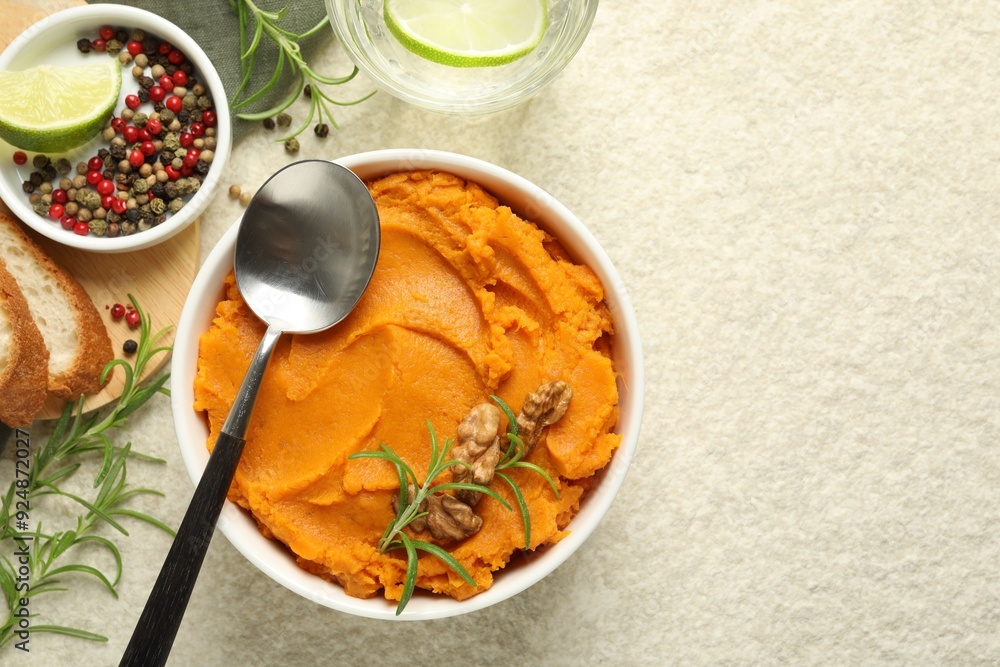 Delicious mashed sweet potatoes served on light table, top view. Space for text Delicious mashed sweet potatoes served on light table, top view. Space for text