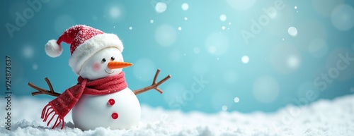 Cheerful snowman with Santa hat smiling in snowy scene against teal background with copy space