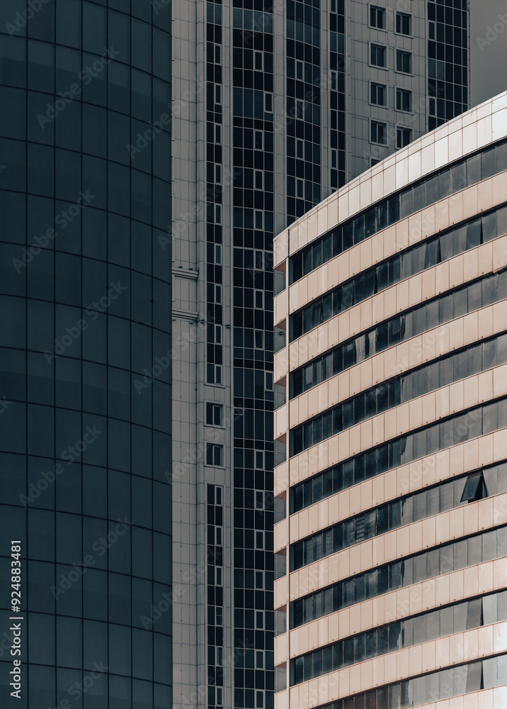 many windows and walls facade of a modern skyscraper without people many windows and walls facade of a modern skyscraper without people