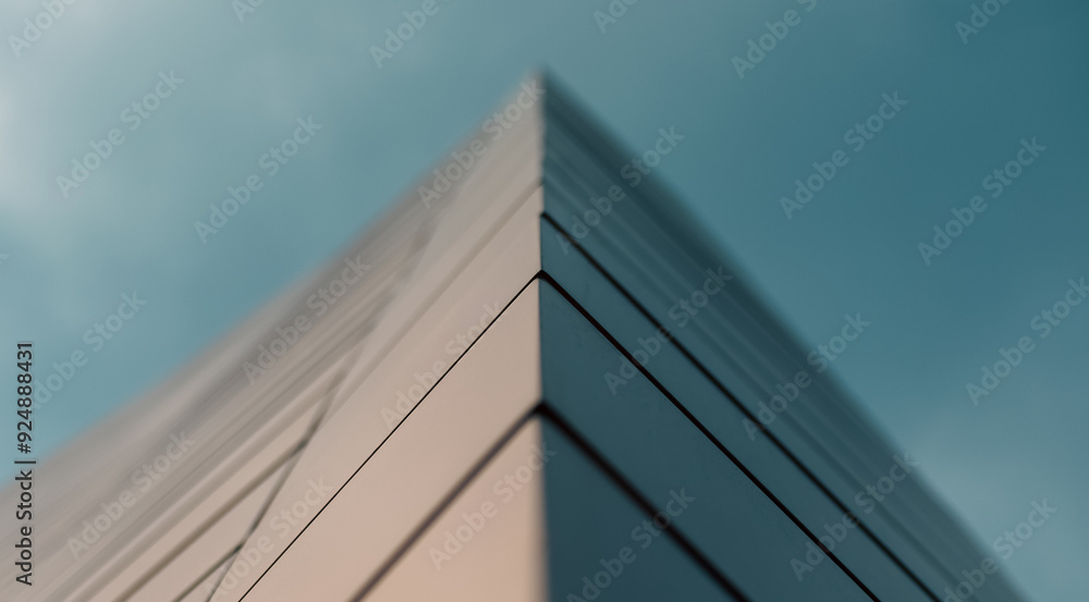 close up wall of a modern building against a blue sky close up wall of a modern building against a blue sky
