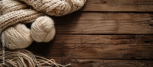 Wooden background with copy space image of wool photo