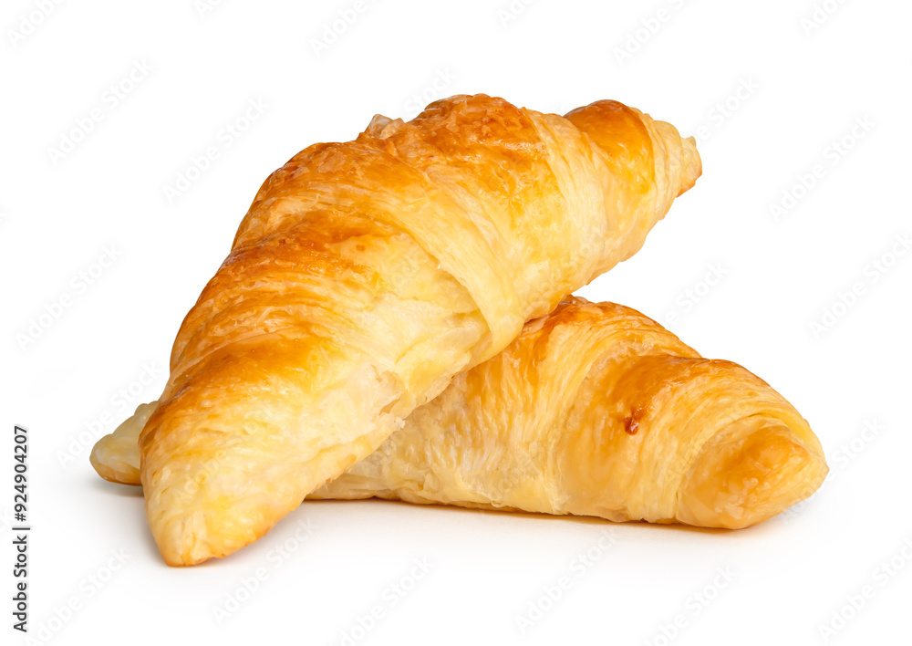 Side view of brown croissants in stack isolated on white background with clipping path Side view of brown croissants in stack isolated on white background with clipping path