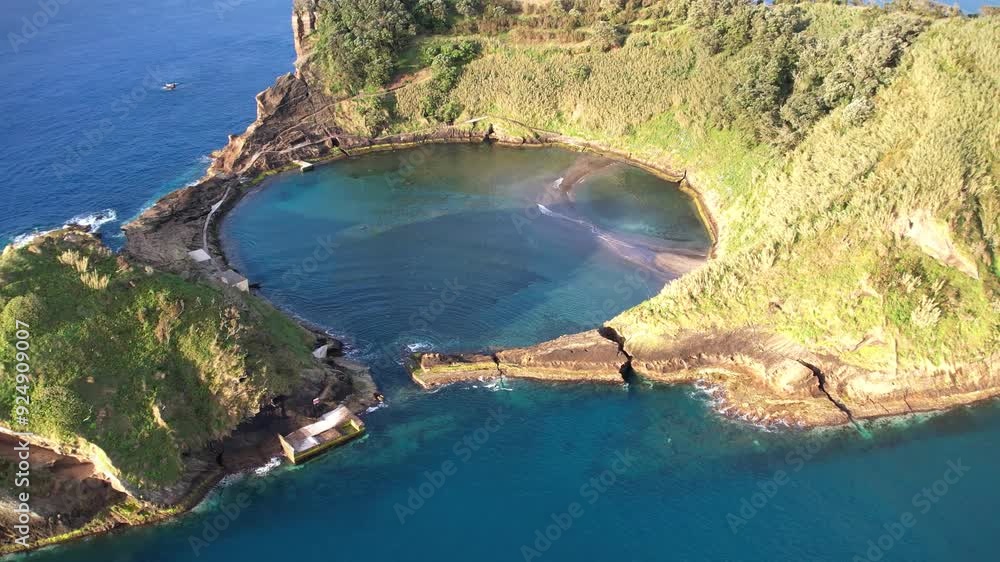 Amazing Azores island Ilheu De Vila Franca Do Campo. An amazing Azores island with a round lake in the middle. View from above. Azores, Sao Miguel, Azores, Portugal. Amazing Azores island Ilheu De Vila Franca Do Campo. An amazing Azores island with a round lake in the middle. View from above. Azores, Sao Miguel, Azores, Portugal.