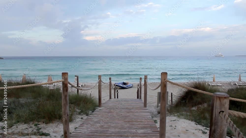Access to Ses Illetes beach at sunrise. Island of Formentera, Balearic Islands, Spain. Access to Ses Illetes beach at sunrise. Island of Formentera, Balearic Islands, Spain.