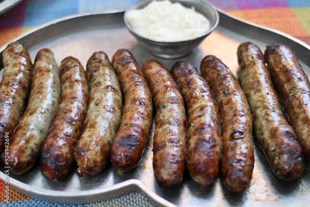 German cuisine: bratwurst (grilled pork sausages) with horseradish in Nuremberg, Germany German cuisine: bratwurst (grilled pork sausages) with horseradish in Nuremberg, Germany
