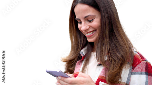 Young woman in the city using smartphone 