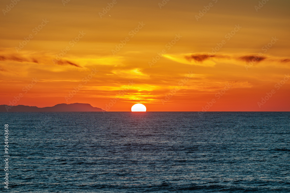 Sunset over the Ionian Sea near the town of Acharavi on the island of Corfu Sunset over the Ionian Sea near the town of Acharavi on the island of Corfu
