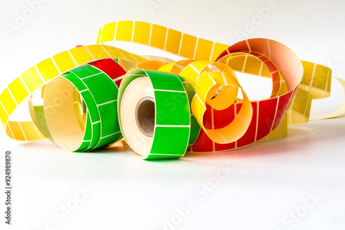 Die-cut rectangular paper self-adhesive stickers for printing information on a printer.