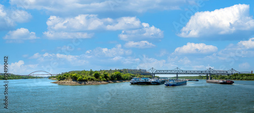 Two bridges at the confluence of the Danube river and The Danube–Black Sea Canal in Cernavodă, Romania photo