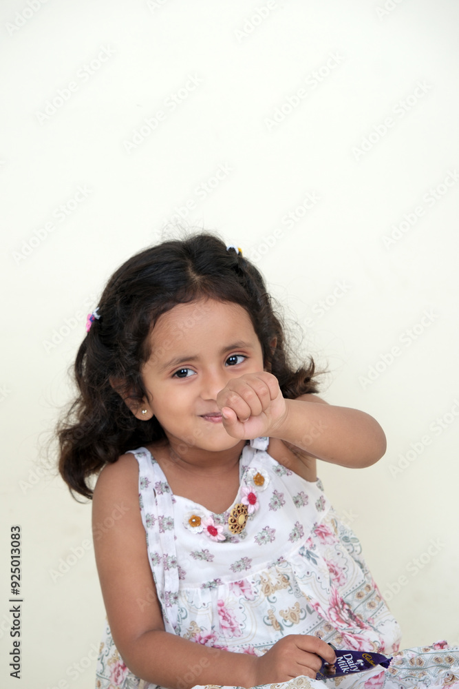 A delightful little girl with sparkling eyes, breaking into a wide, infectious smile. Her expression radiates pure happiness and innocence. A delightful little girl with sparkling eyes, breaking into a wide, infectious smile. Her expression radiates pure happiness and innocence.