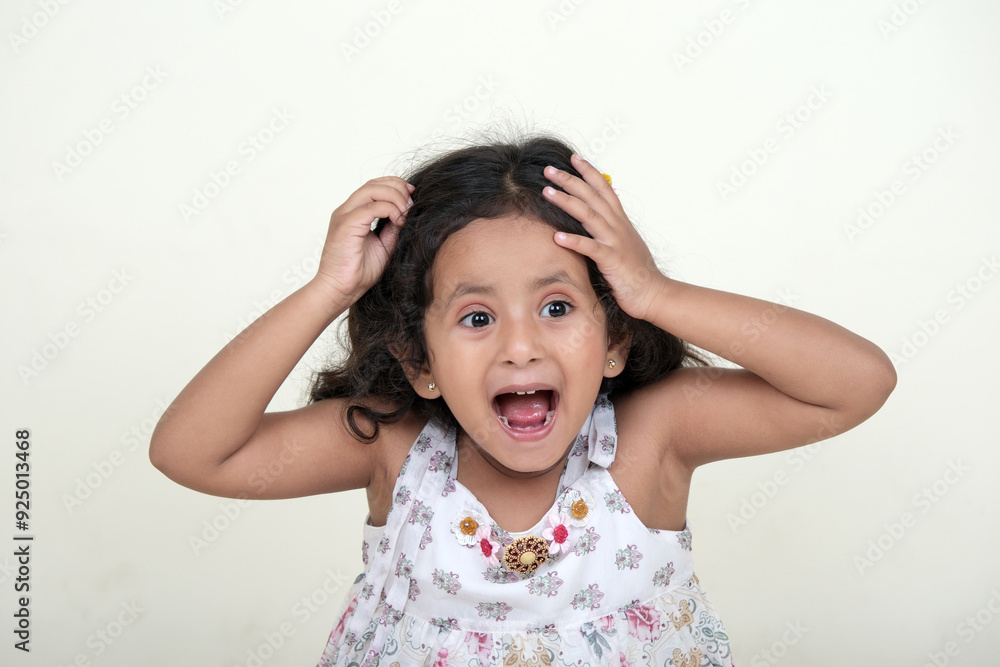 A delightful little girl with sparkling eyes, breaking into a wide, infectious smile. Her expression radiates pure happiness and innocence. A delightful little girl with sparkling eyes, breaking into a wide, infectious smile. Her expression radiates pure happiness and innocence.