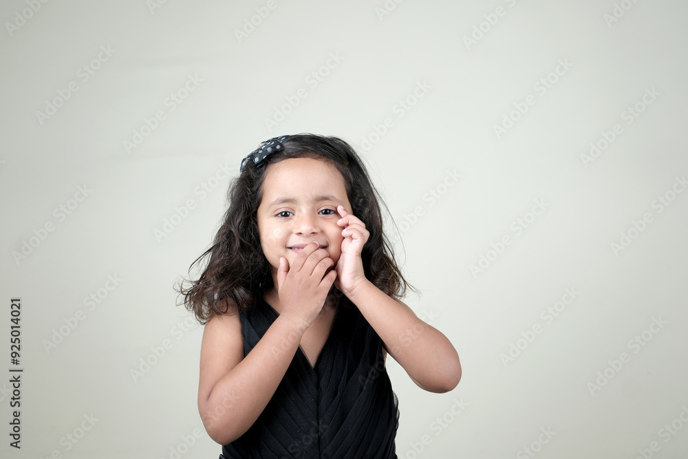 A delightful little girl with sparkling eyes, breaking into a wide, infectious smile. Her expression radiates pure happiness and innocence. A delightful little girl with sparkling eyes, breaking into a wide, infectious smile. Her expression radiates pure happiness and innocence.