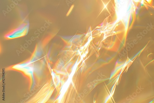 Warm background with bright iridescent sunlight flares and colorful refractions photo